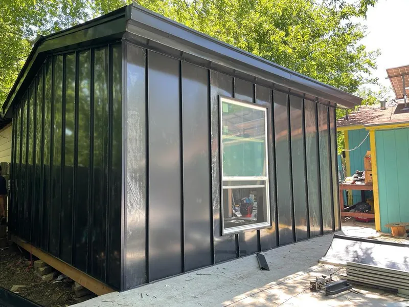 Black standing seam metal wall panels for Roof Inspection in Fredericksburg